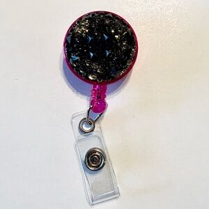 Retractable badge holder
